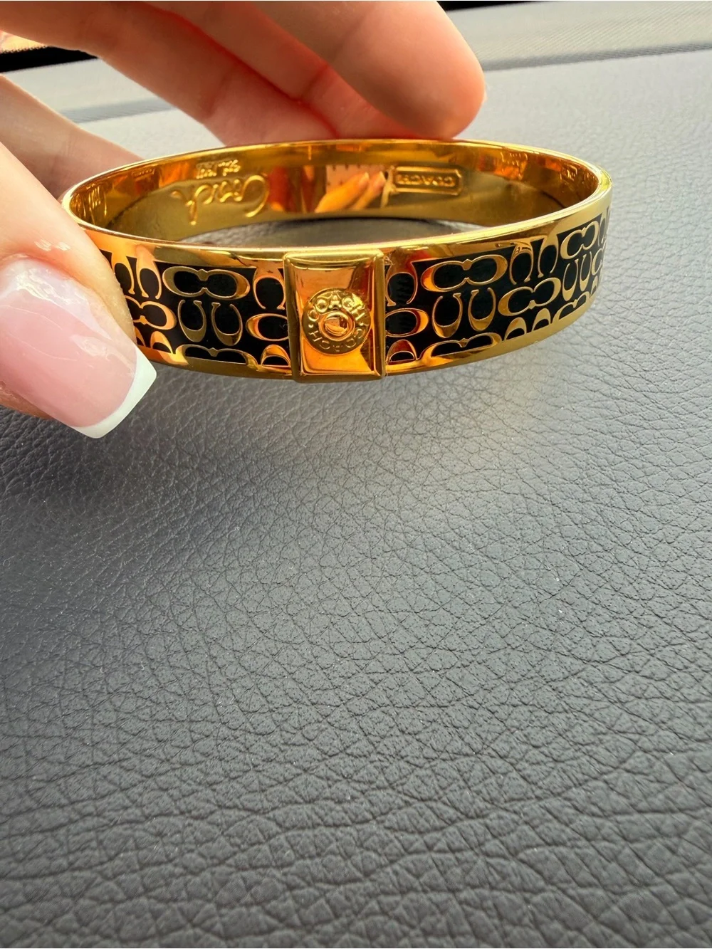 Coach Gold-Tone Bracelet with Black Enamel Signature Pattern